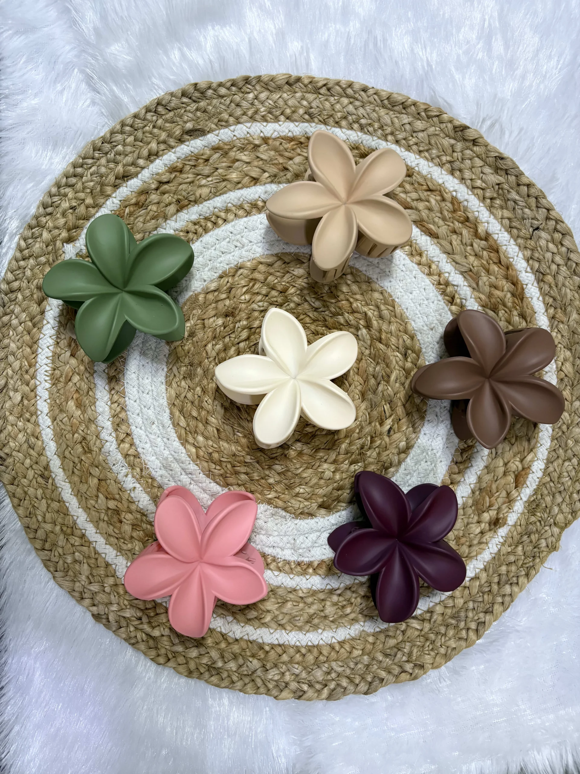 Earthy tone flower hair claw clips set of 4 on jute mat - olive, cream, tan, brown, beige, pink, plum.